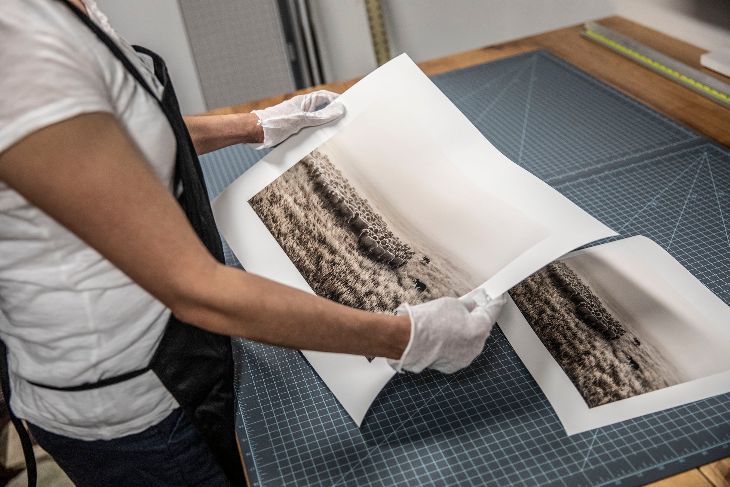 Tadd Myers inspecting the print