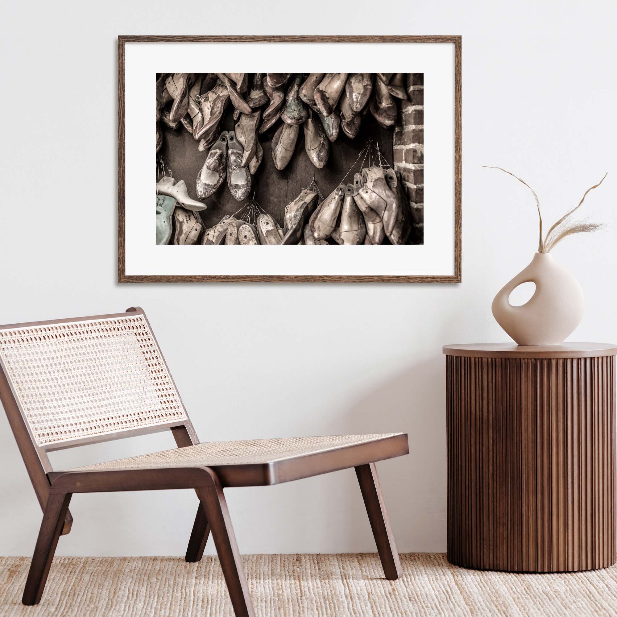 Tadd Myers, Making Boots - boot molds hanging on the wall in the shop.