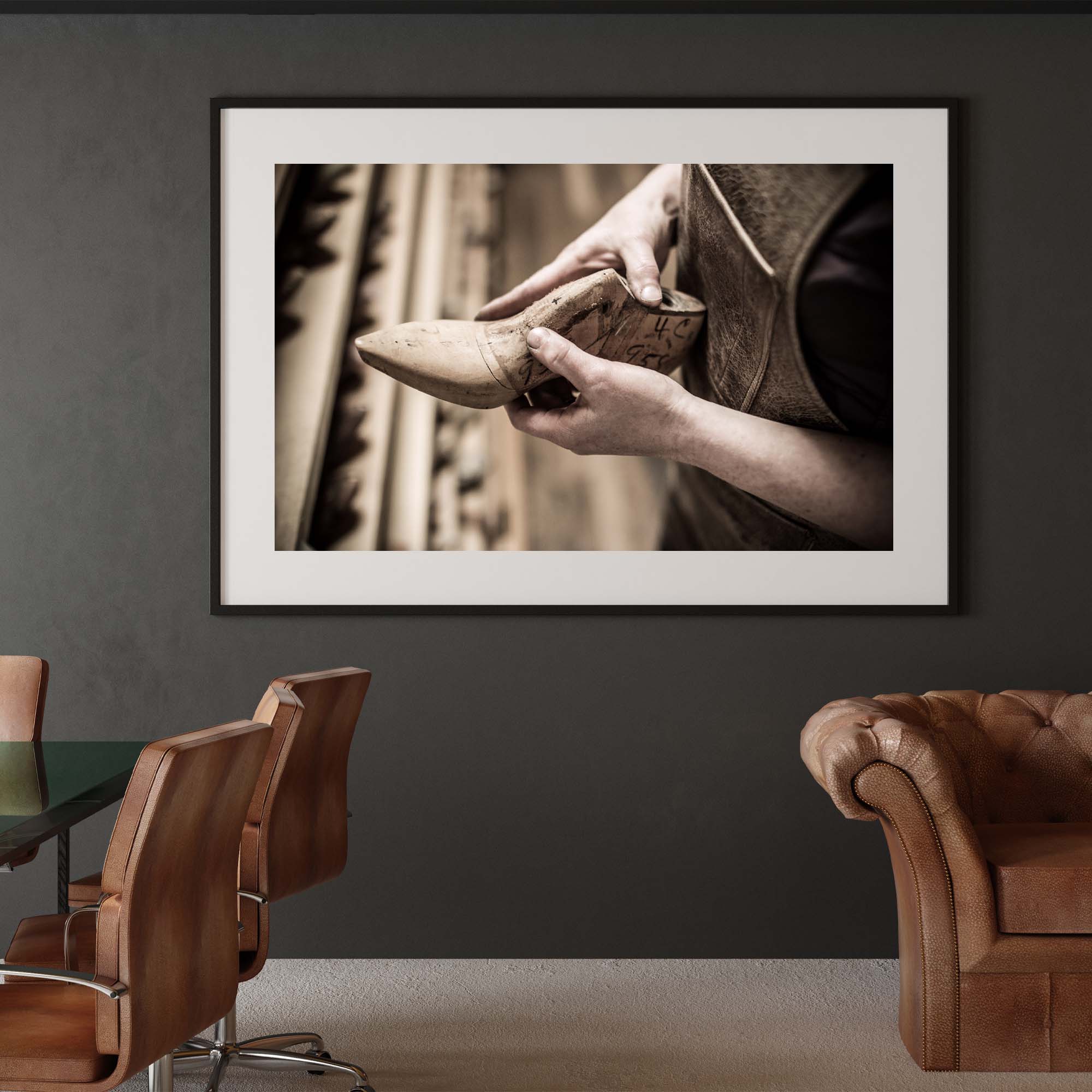 Tadd Myers, Making Boots, choosing the boot mold - example photo on a wall.