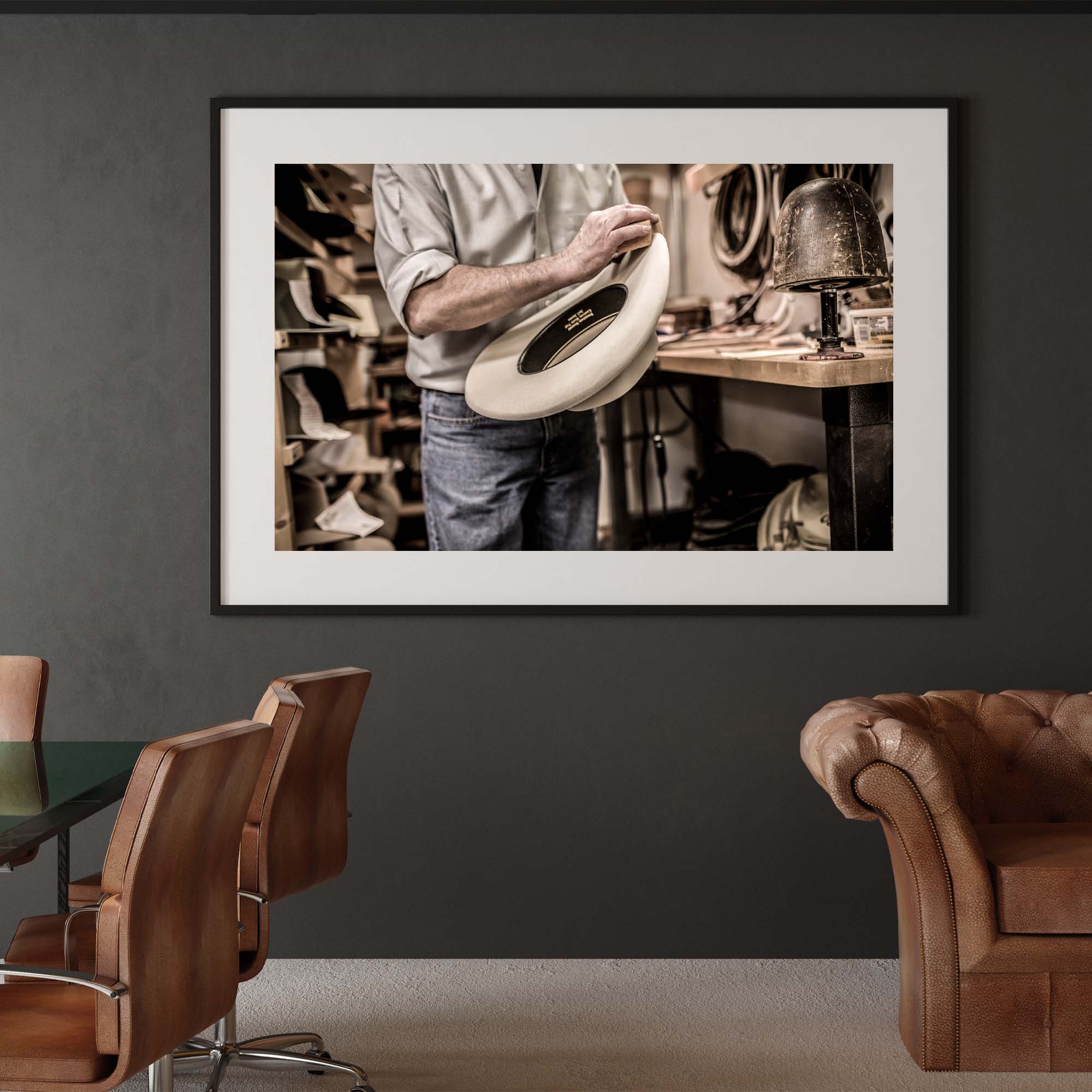 Tadd Myers, Hat making photographic print on a wall